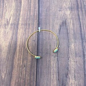 MACY’S GOLD BANGLE WITH TEAL STONE SY19